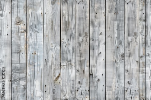 Weathered gray wooden planks with a grayish tone, showcasing natural textures and patterns. Ideal for backgrounds or rustic themes.