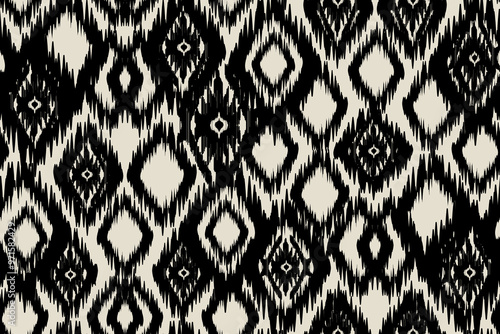 Ikat paisley embroidery on the fabric in Indonesia, India and Asian countries.geometric ethnic oriental seamless pattern.Aztec style. illustration. design for texture, fabric,clothing,wrapping,carpet.