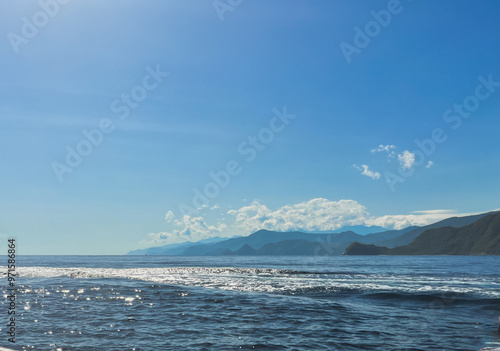 long island summer landscape view from boat ride - sea waves and mountain