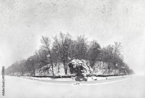 a frozen lake, rock