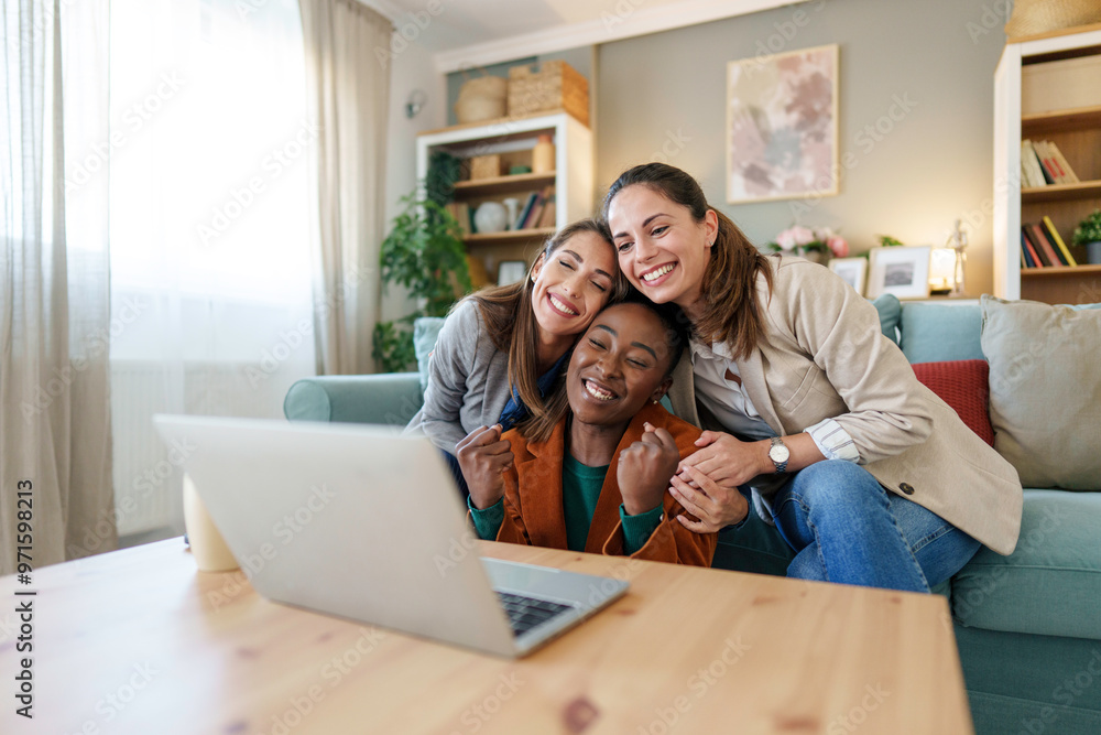 Diverse Friends Enjoying a Group Video Call at Home Diverse Friends Enjoying a Group Video Call at Home
