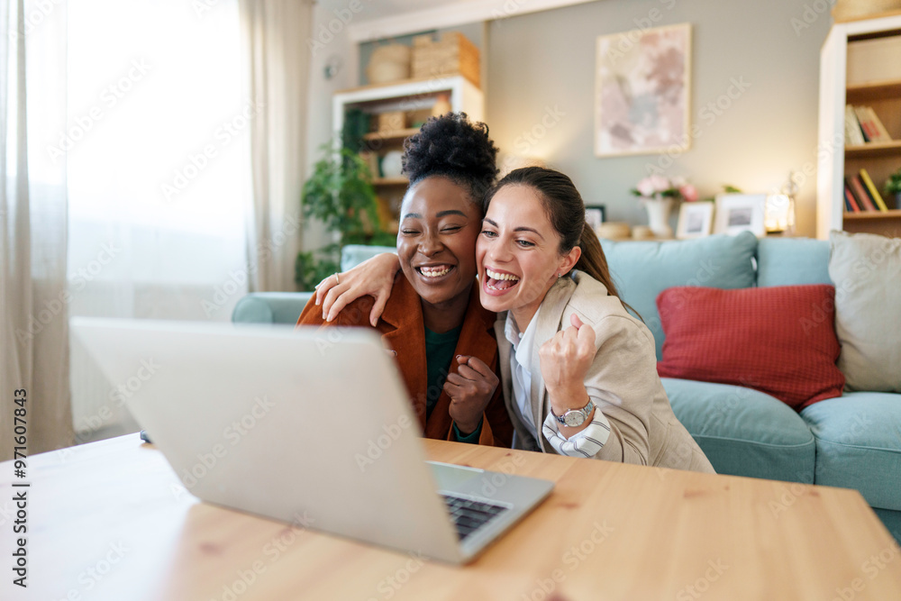 Two Female Entrepreneurs Celebrating Success in Home Business Two Female Entrepreneurs Celebrating Success in Home Business