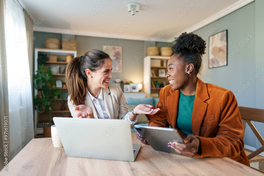 Remote Collaboration Between Diverse Businesswomen Remote Collaboration Between Diverse Businesswomen