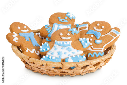 christmas gingerbread cookie in a wicker basket isolated on white background photo