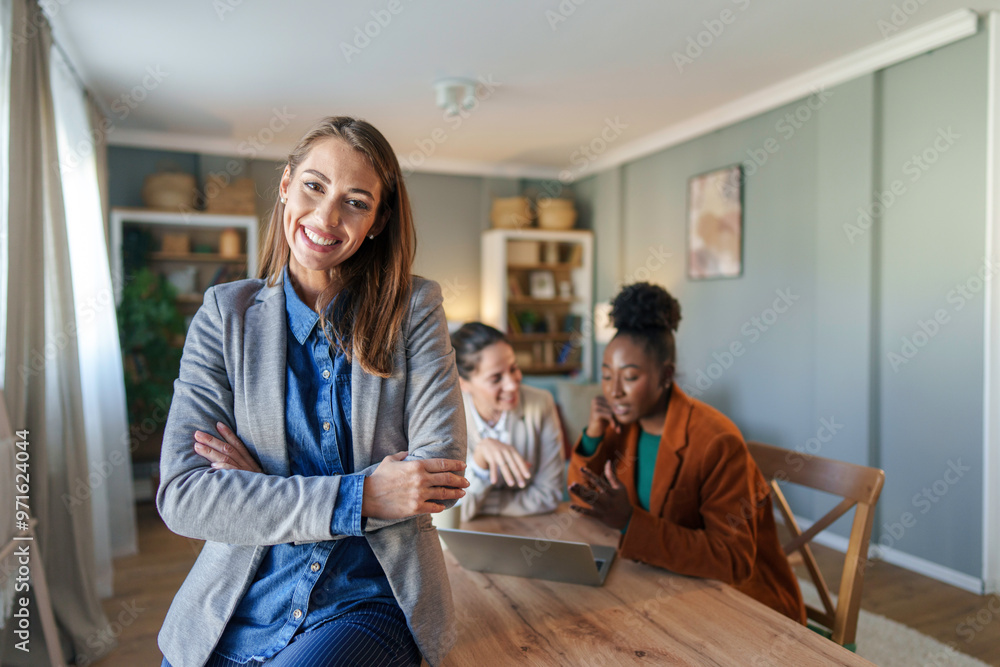 Obraz premium Smiling Businesswoman with Digital Tablet in Home Office