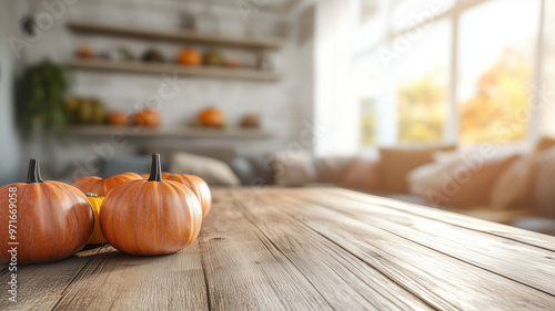 A wooden blank table with pumpkins in a modern minimalist house living room photo