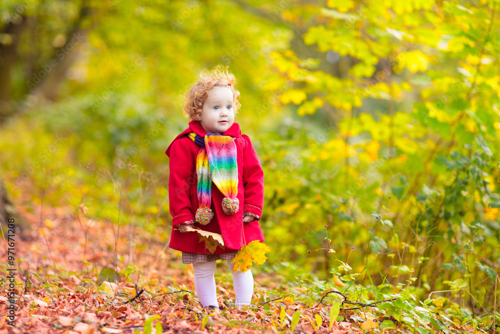 Kids playing in autumn park Kids playing in autumn park