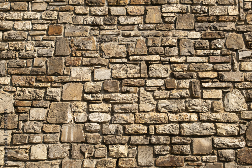 stone wall made of limestone, typical of ancient cities. The craftsmanship of stonemasons is evident in the construction. stone wall made of limestone, typical of ancient cities. The craftsmanship of stonemasons is evident in the construction.