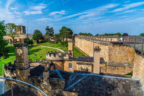 A view over the castle entrance main gate and battlements in Lincoln, Lincolnshire in summertime photo