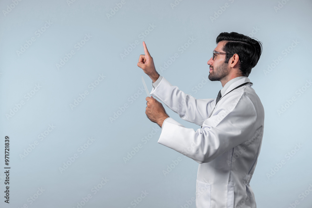 Side view of smart doctor pointing and checking and looking at chart or application form. Professional doctor diagnosis and analysis medical data while wearing lab coat and stethoscope. Deviation. Side view of smart doctor pointing and checking and looking at chart or application form. Professional doctor diagnosis and analysis medical data while wearing lab coat and stethoscope. Deviation.