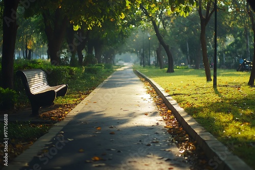 Empty Bench in a Park Pathway with Lush Greenery