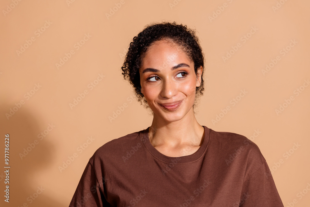Fototapeta premium Photo of lovely sweet adorable woman wear stylish clothes look empty space isolated on beige color background