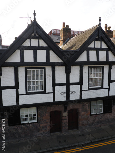 parish boundary markers on old almshouses in Park street Chester marking the boundary between St Oswald Parish