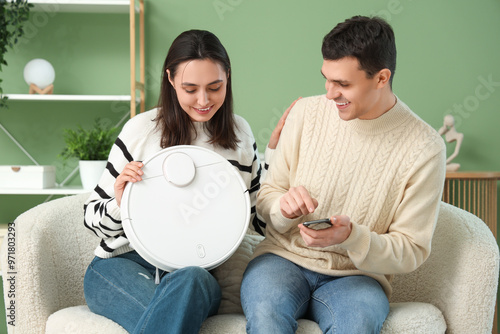 Young couple with modern ro...