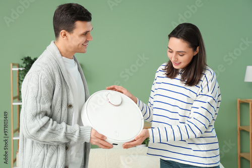 Young couple with modern ro...