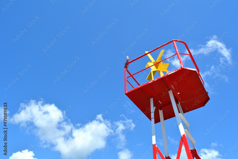 Isolated marine steel navigation buoy. End of summer concept. Buoy on blue sky background with copyspace for text. Isolated marine steel navigation buoy. End of summer concept. Buoy on blue sky background with copyspace for text.