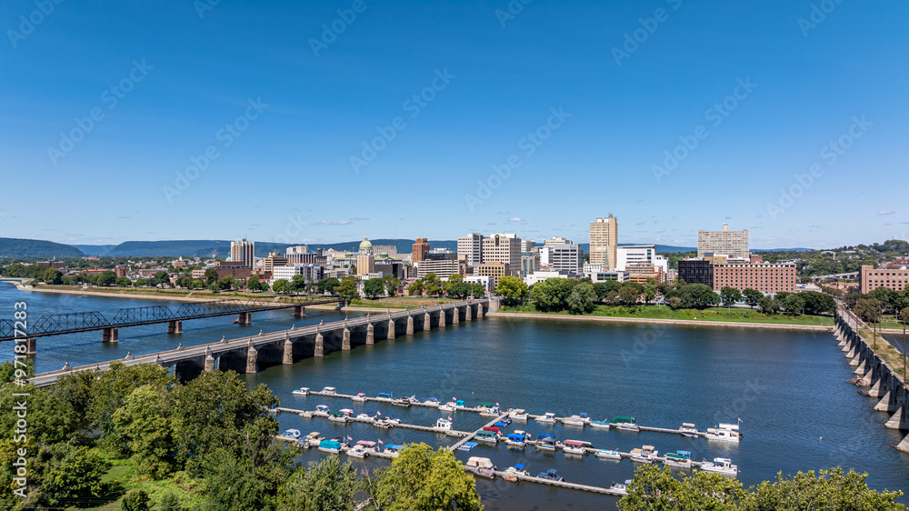Fototapeta premium Late summer, early fall aerial, drone, photo of the Harrisburg Pennsylvania skyline and the Susquehanna River. September 2024.