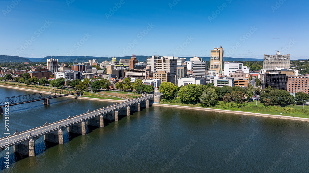 Late summer, early fall aerial, drone, photo of the Harrisburg Pennsylvania skyline and the Susquehanna River. September 2024. Late summer, early fall aerial, drone, photo of the Harrisburg Pennsylvania skyline and the Susquehanna River. September 2024.