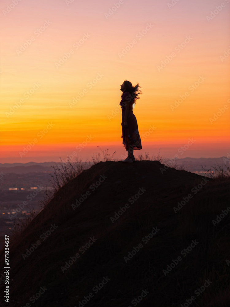 Fototapeta premium Happy Woman Enjoying Sunset View from Hilltop