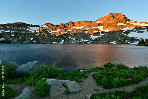 Alpenglow lights Round Top Mountain (10,381') across Winnemucca Lake in the Mokelumne Wilderness of California.
 photo