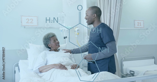 Image of element diagram over happy african american male doctor and senior female patient