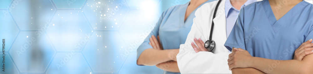 Doctors on blurred background, closeup. Banner design with space for text