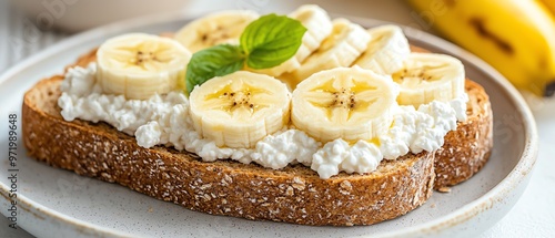 Whole wheat bread topped with cottage cheese and sliced bananas, brain-boosting breakfast, healthy and delicious