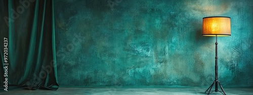 dimly lit room, vintage style, teal colored walls with stained textures, heavy green curtains draped to one side, single warm glowing lamp on a side table, dark ambiance, moody atmosphere
 photo