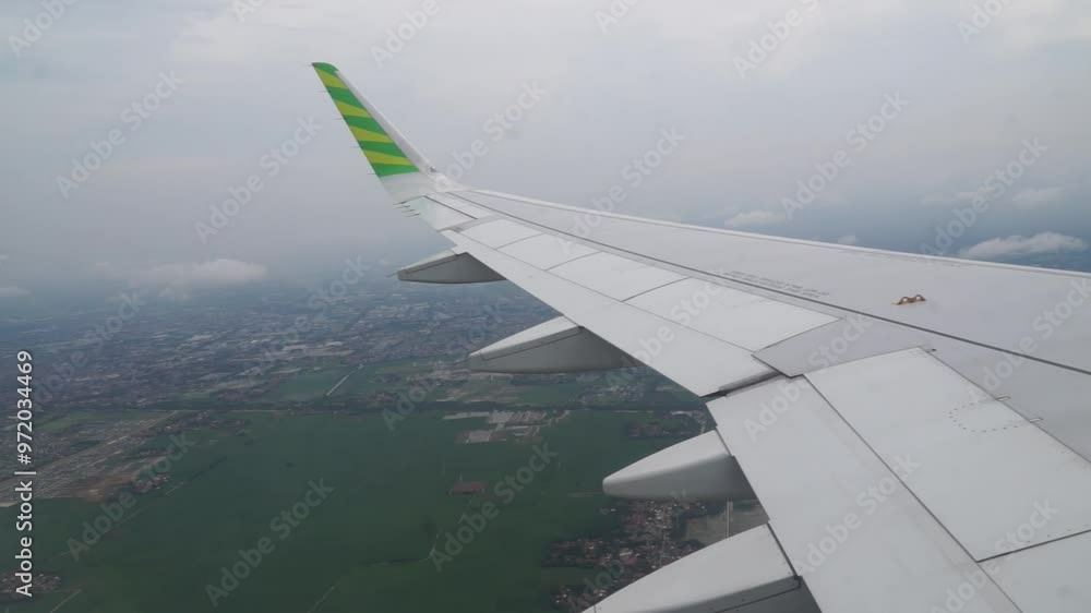 From inside the cabin, the plane was seen flying over Semarang City, Central Java. From inside the cabin, the plane was seen flying over Semarang City, Central Java.