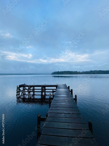 A jetty at the lake, pier on the lake with beautiful landscapes 