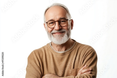 Happy middle aged man in glasses smiling with crossed arms.