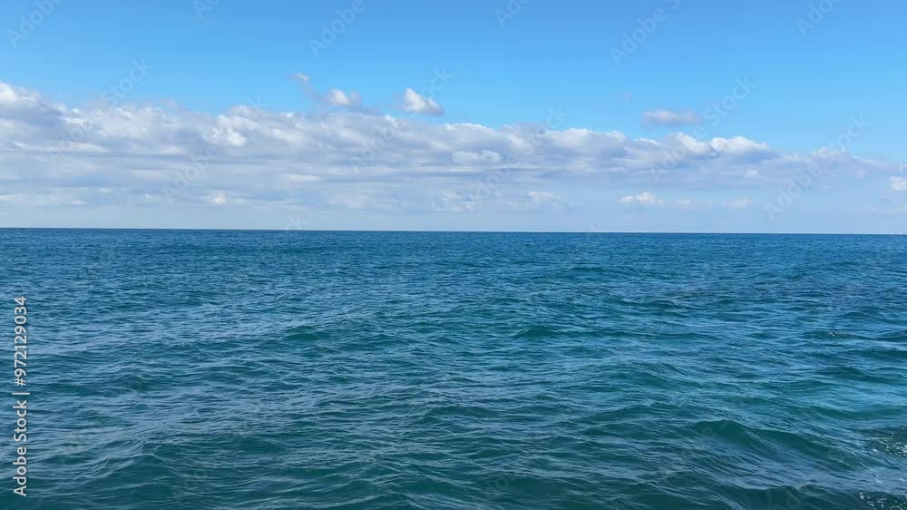 Blue ocean waves and cloudy sky. Blue ocean waves and cloudy sky.