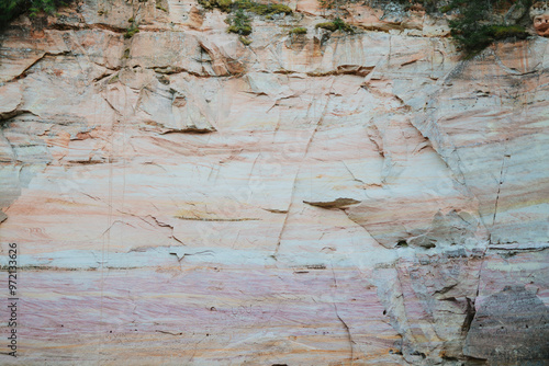 Beautiful sandstone cliffs and caves in Southern Estonia, Taevaskoda nature trail on a summer day photo