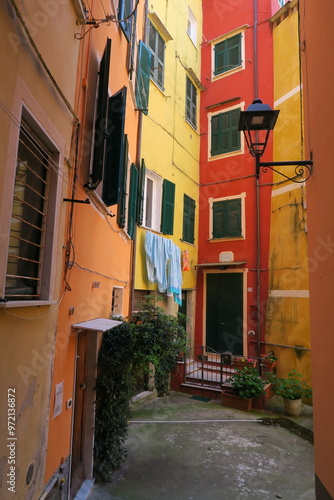 Typical Ligurian street scene with colorful buildings photo