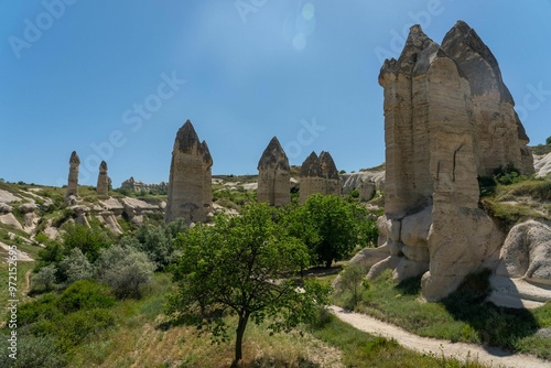 Scenic view of Cappadocia's fairy chimneys in Turkey, with rock formations in Goreme and Urgup