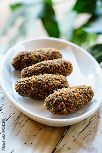 Squid ink croquettes, Sant Cugat del Vallès, (Vallès Occidental), Catalonia, Spain photo