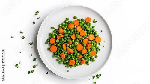 Colorful plate of fresh peas and carrots garnished with parsley