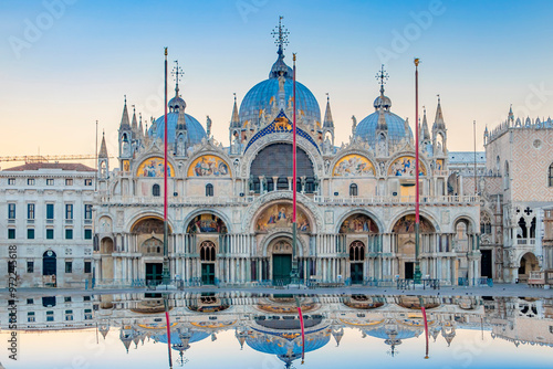 Obraz na płótnie Sunrise in San Marco square with Campanile and San Marco's Basilica. The main square of the old town. Venice, Veneto Italy. Reflection on the flooded square. w salonie