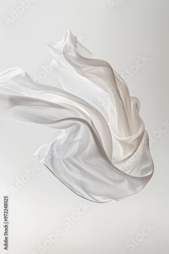 A white cloth flying through the air