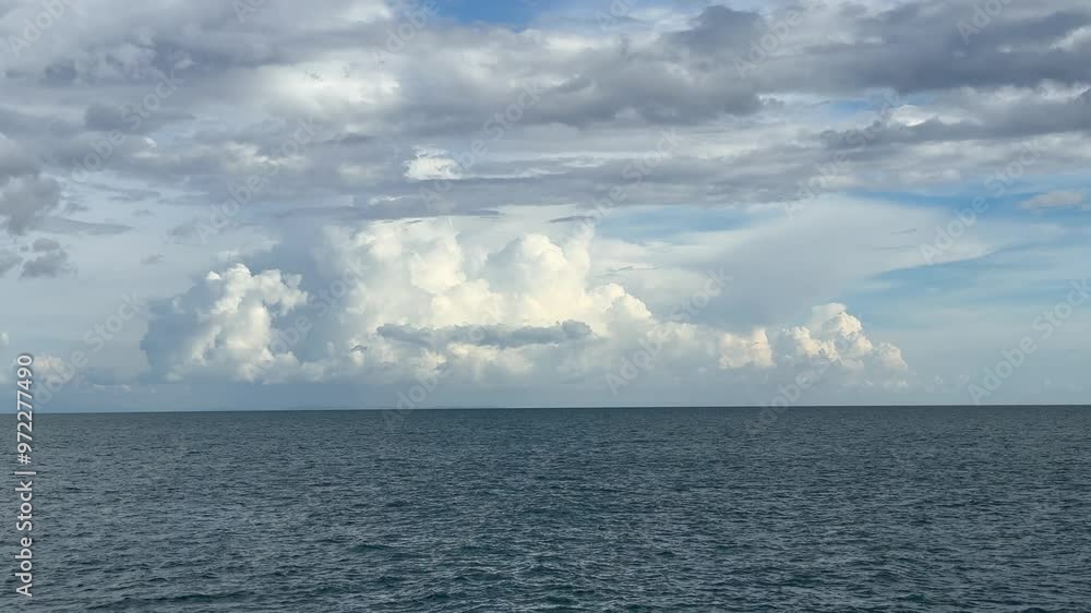 Amazing fluffy clouds and dark sea waters. Amazing fluffy clouds and dark sea waters.