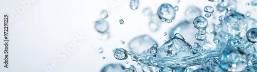 Wallpaper Mural Clear Blue Water Splash, a vibrant display of translucent water droplets and splashes, set against a pure white backdrop, emphasizing minimalist elegance and fluid motion. Torontodigital.ca