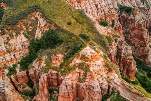 Red rocky slopes Rapa Roșie is a protected geological and floristic reservation area near Sebes alba in Romania photo