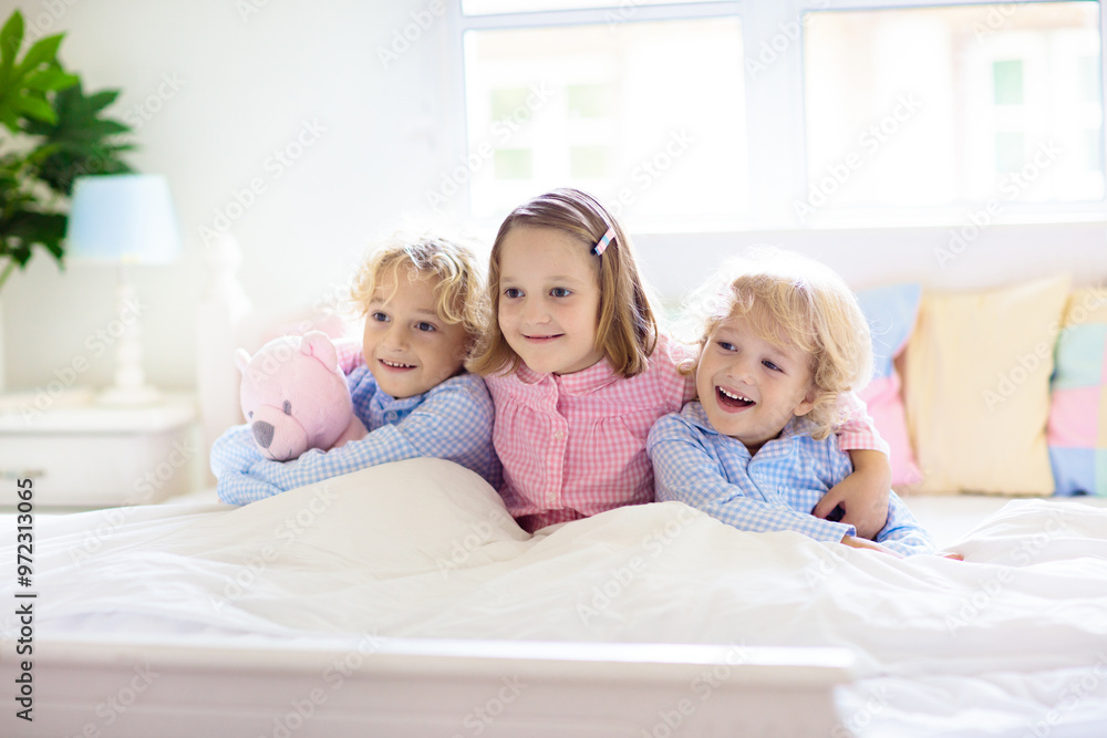 Kids play in bed. Children at home. Kids play in bed. Children at home.
