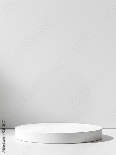 White podium or pedestal, smooth round shape as a background for product presentation with copy space. Minimalist style