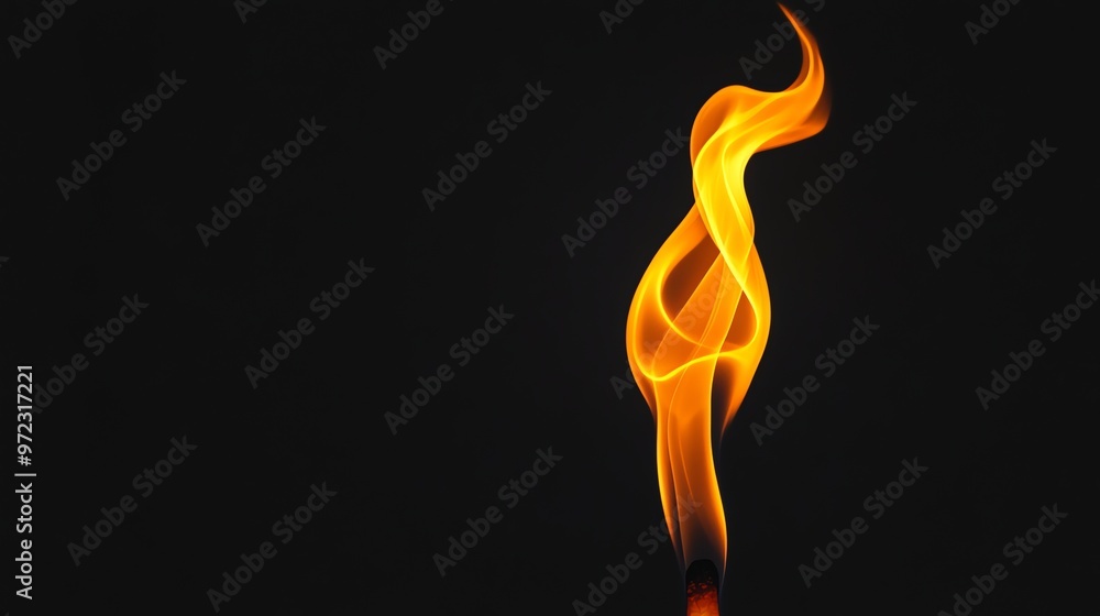 A single, bright flame on a black background. A single, bright flame on a black background.