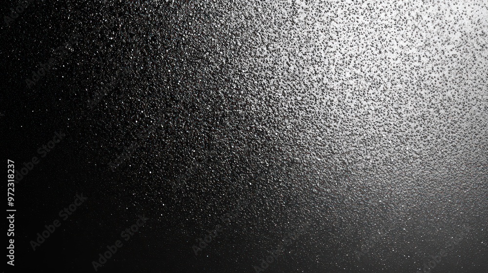 A mesmerizing close-up of water droplets cascading on a dark surface, creating a shimmering effect. A mesmerizing close-up of water droplets cascading on a dark surface, creating a shimmering effect.