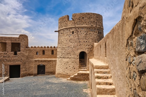 Historical medieval Fujairah Fort, heritage site and museum, popular tourist destination for internal tourism, family weekend traveling in the UAE photo