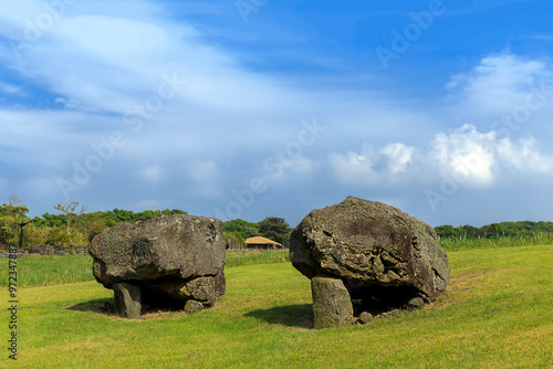 Dolmens on the grass of Jeju Stone Park at Jeju-si near Jejudo Island, South Korea photo