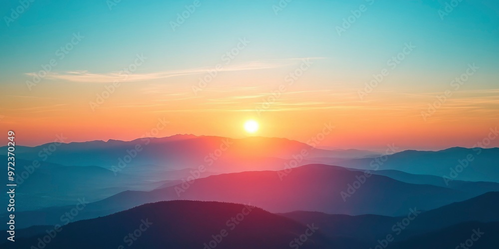 Silhouetted Mountain Ranges with a Sunset Sky Silhouetted Mountain Ranges with a Sunset Sky