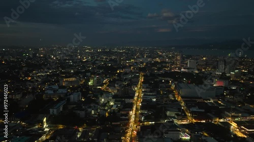 City at night with illuminated street lights. Davao City. Mindanao, Philippines. photo